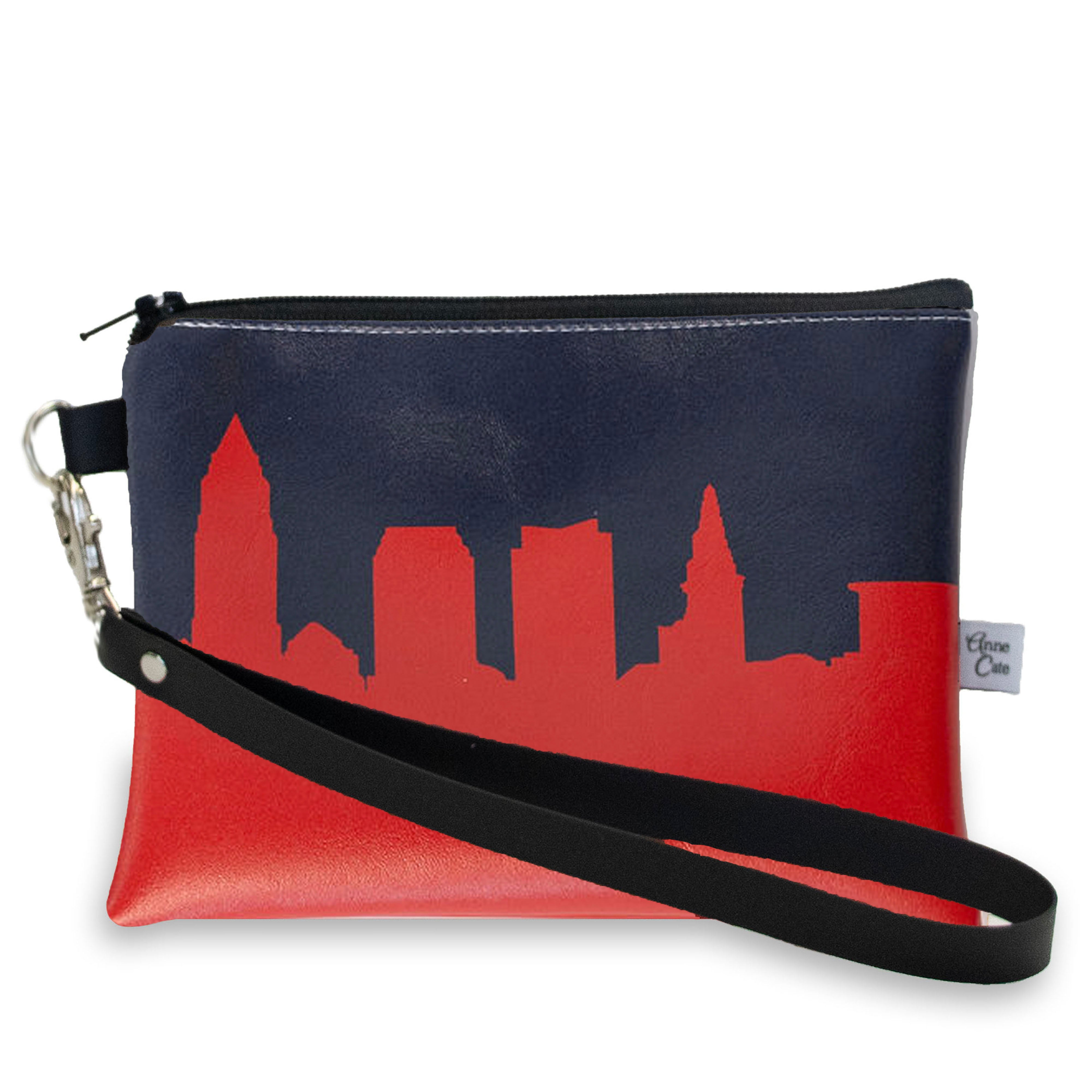 Clutch bag with city skyline design on a white background